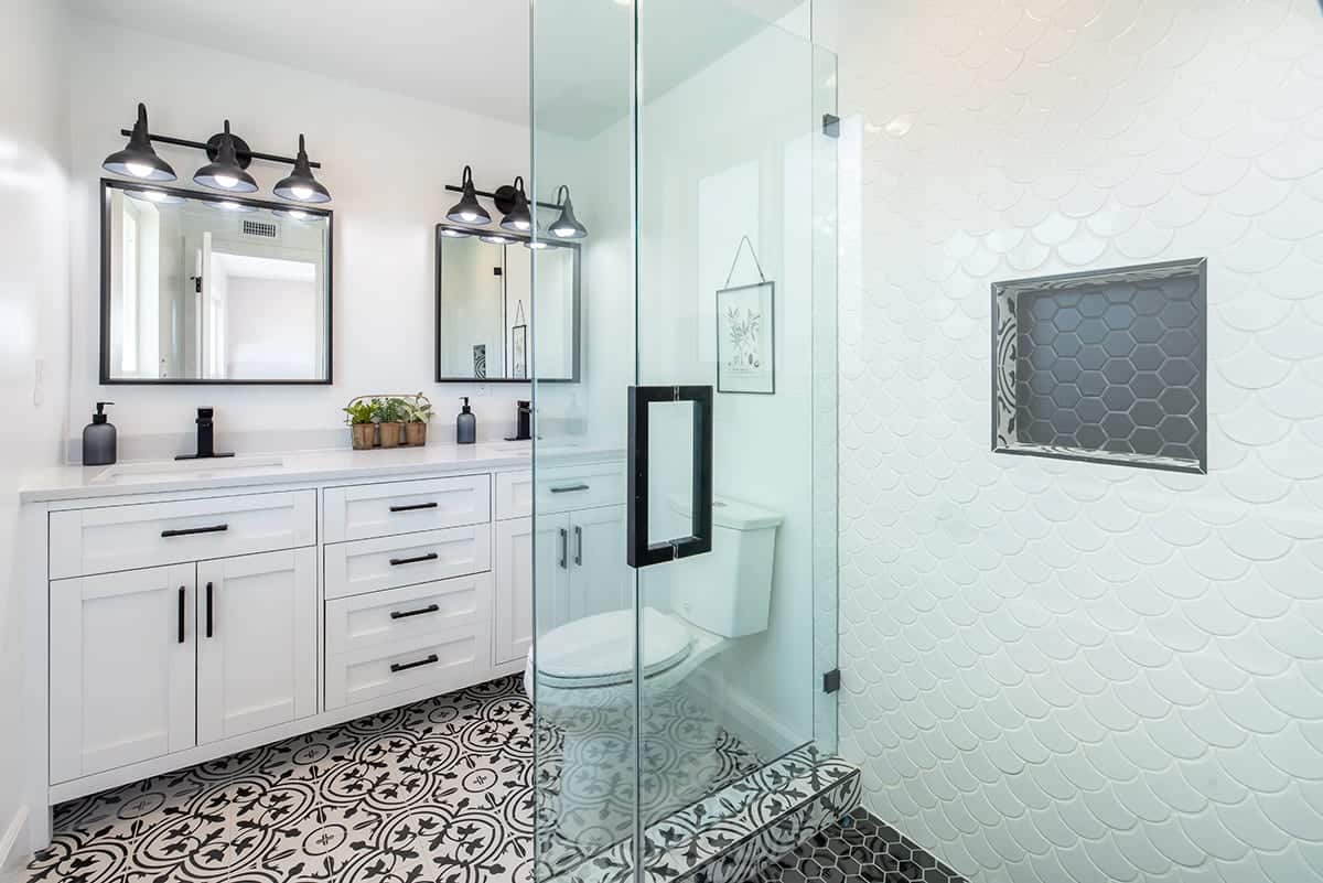 Spotless bathroom cleaning for Airbnb and vacation rentals in Sarasota, Florida – glass shower and vanity area